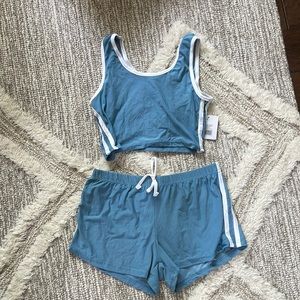 Soft set, size medium but made small, new never worn